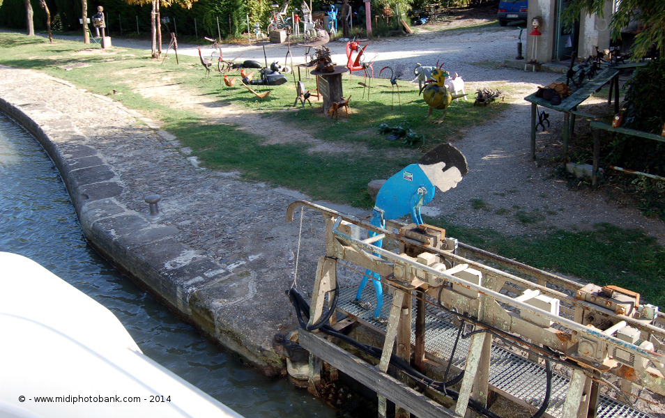 Some of the wooden carvings and animated work at the Aiguille lock
