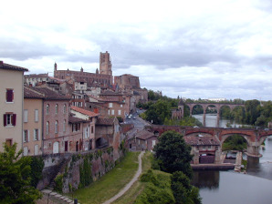 The Cathedral of St Cecile overlooking the river
	Tarn with the Vieux Pont and Pont du 22 Août 1944