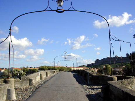 The old stone bridge over the River Aude joins the new town with the Medieval City of Carcassonne